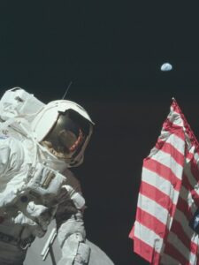 Astronaut H. Schmitt with US flag, photo: NASA (PD)